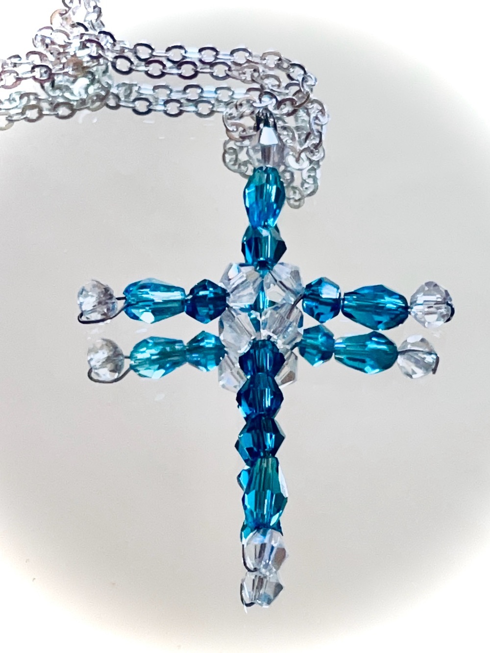 Wired Crystal Cross Pendant Necklace - Teal and Clear
Silver chain